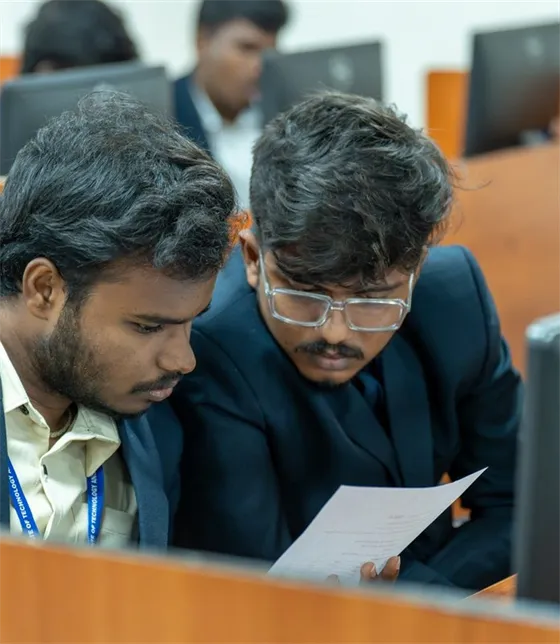 Students reviewing a document together